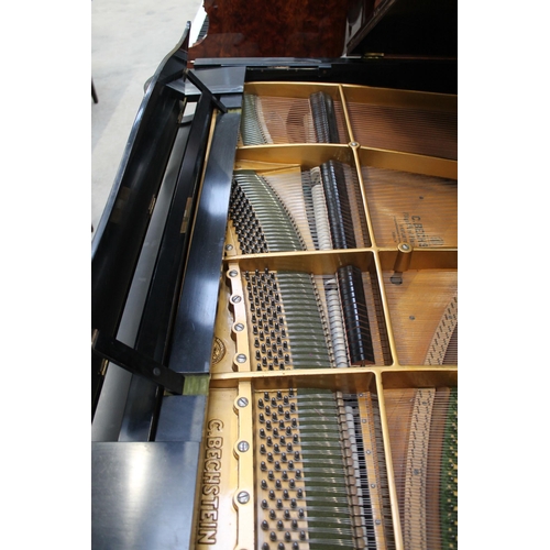 3 - Bechstein (c1931)A 5ft 10in Model M grand piano in an ebonised case on square tapered legs; together... 