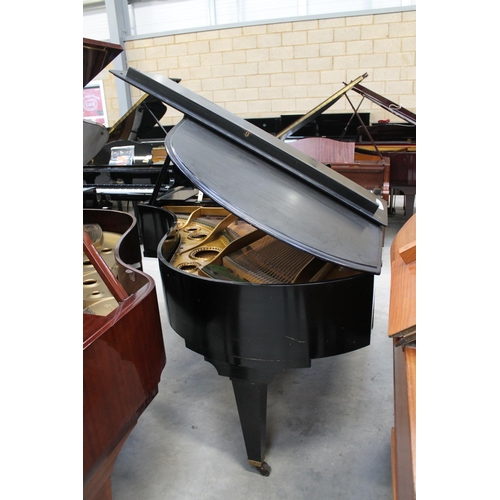3 - Bechstein (c1931)A 5ft 10in Model M grand piano in an ebonised case on square tapered legs; together... 