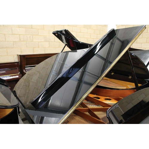 30 - Bösendorfer (c1986)A 6ft 7in Model 200 grand piano in a bright ebonised case on square tapered legs;... 
