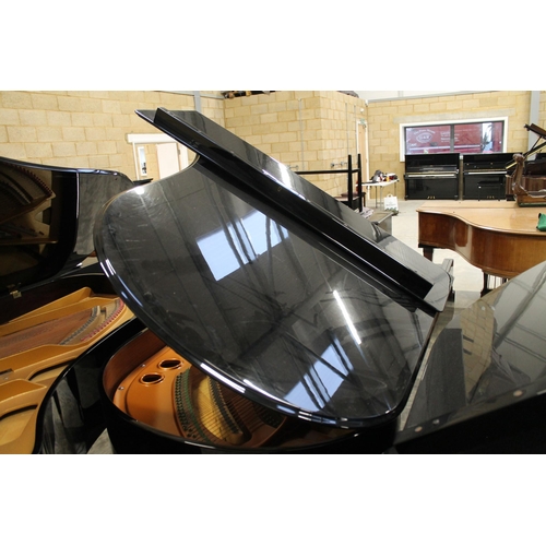 30 - Bösendorfer (c1986)A 6ft 7in Model 200 grand piano in a bright ebonised case on square tapered legs;... 