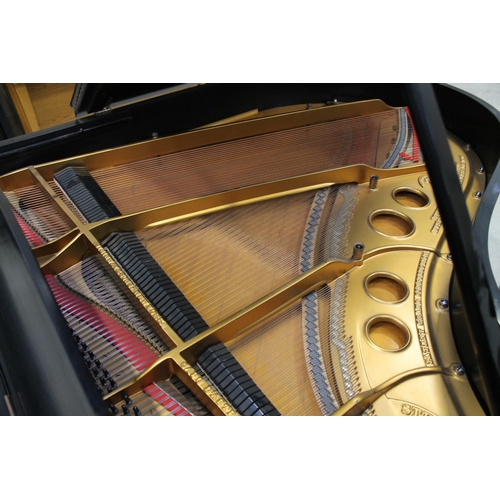 49 - Steinway (c1918)A 5ft 10in Model O grand piano in an ebonised case on square tapered legs.