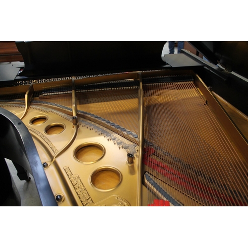 49 - Steinway (c1918)A 5ft 10in Model O grand piano in an ebonised case on square tapered legs.
