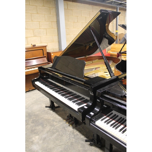 7 - Yamaha (c1992)A 6ft 1in Model C3 grand piano in a bright ebonised case on square tapered legs, on an... 