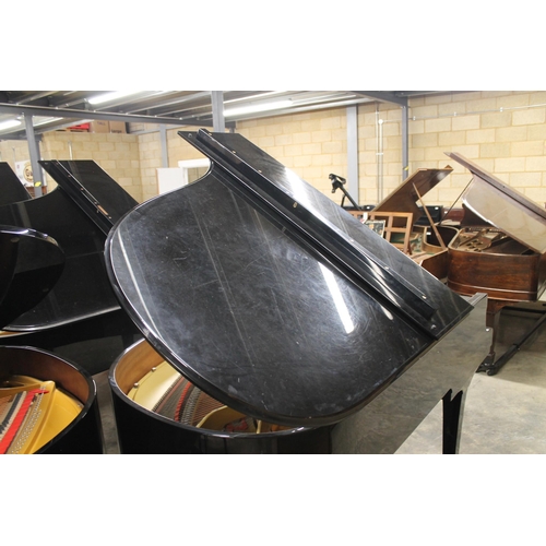 7 - Yamaha (c1992)A 6ft 1in Model C3 grand piano in a bright ebonised case on square tapered legs, on an... 