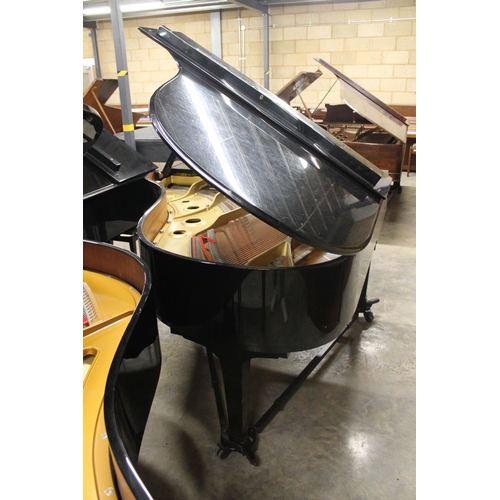 7 - Yamaha (c1992)A 6ft 1in Model C3 grand piano in a bright ebonised case on square tapered legs, on an... 