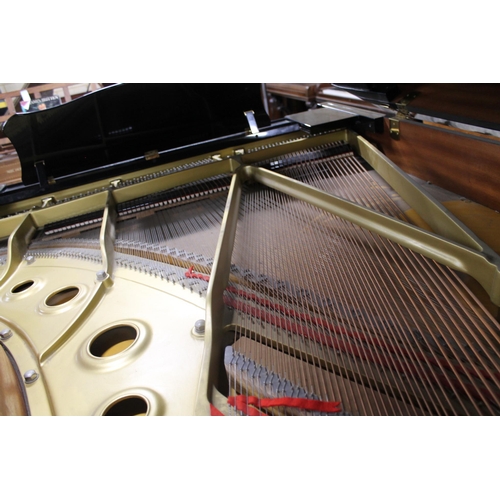 7 - Yamaha (c1992)A 6ft 1in Model C3 grand piano in a bright ebonised case on square tapered legs, on an... 