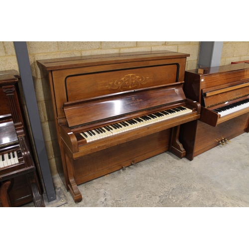 8 - Steinway (c1907)An upright piano in an inlaid rosewood case.
