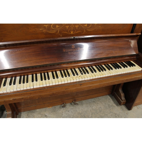 8 - Steinway (c1907)An upright piano in an inlaid rosewood case.