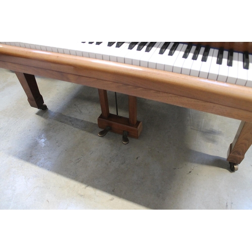 18 - Blüthner (c1979)A 6ft 3in grand piano in a bright walnut case on square tapered legs.