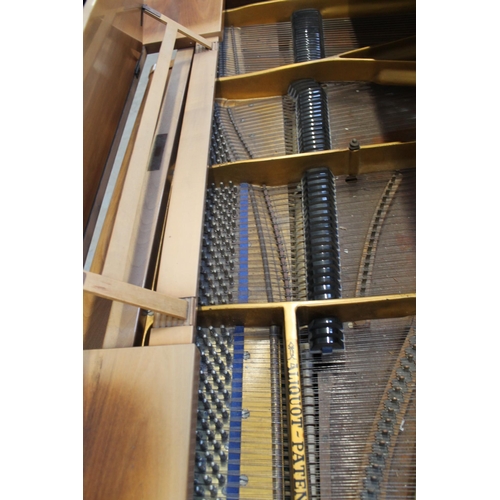 18 - Blüthner (c1979)A 6ft 3in grand piano in a bright walnut case on square tapered legs.