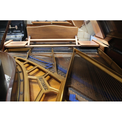 18 - Blüthner (c1979)A 6ft 3in grand piano in a bright walnut case on square tapered legs.
