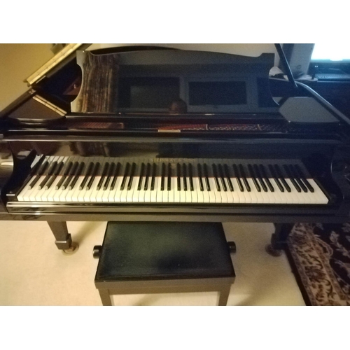 26 - Steinway (c1928)A 5ft 10in Model O grand piano in a bright ebonised case on square tapered legs. Thi... 