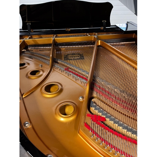 10 - Yamaha (c2002)A 5ft 3in Model C1 grand piano in a bright ebonised case on square tapered legs.