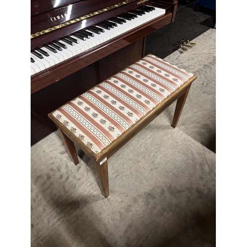 101 - Yamaha (c1980)A Model M5J upright piano in a bright mahogany case; together with a stool.