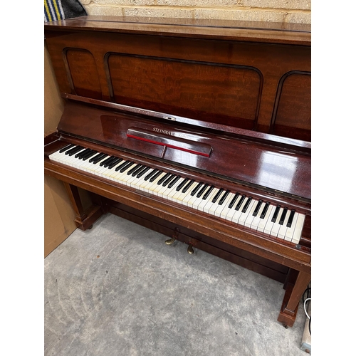 103 - Steinway (c1929)A Model K upright piano in a traditional  mahogany case. IRN: ZM1AVM1Q