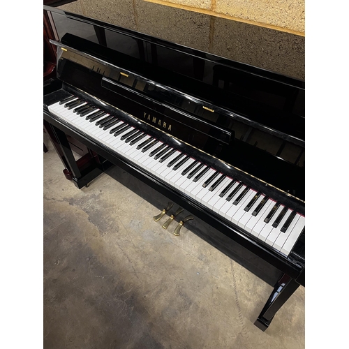 105 - Yamaha (c2000)A Model LX-113 T-PE upright piano in a bright ebonised case; together with a stool.... 
