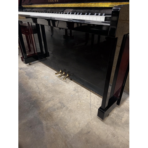 105 - Yamaha (c2000)A Model LX-113 T-PE upright piano in a bright ebonised case; together with a stool.... 