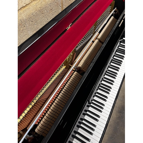105 - Yamaha (c2000)A Model LX-113 T-PE upright piano in a bright ebonised case; together with a stool.... 