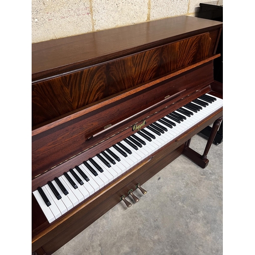 106 - Chappell (c1988)An upright piano in a traditional case with figured mahogany front panel; together w... 