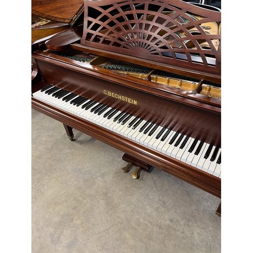 108 - Bechstein (c1910)A 6ft 7in Model B grand piano in a mahogany Sheraton style case, raised on dual squ... 