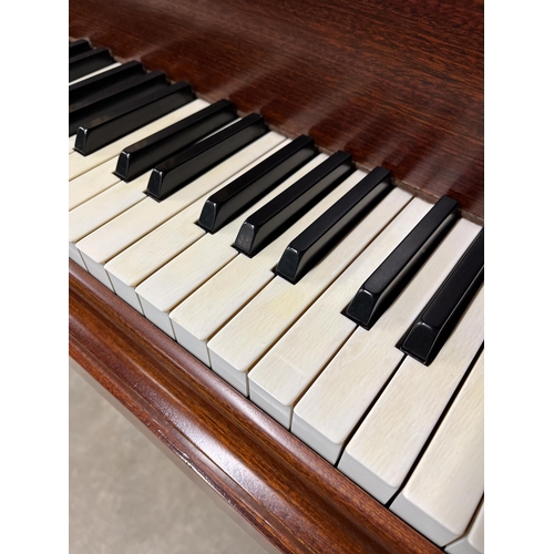 108 - Bechstein (c1910)A 6ft 7in Model B grand piano in a mahogany Sheraton style case, raised on dual squ... 