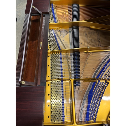 109 - Blüthner (c1910)A 7ft 3in grand piano in a rosewood case, fitted with a roller action, raised on tur... 