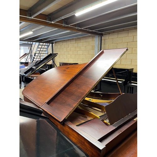 109 - Blüthner (c1910)A 7ft 3in grand piano in a rosewood case, fitted with a roller action, raised on tur... 