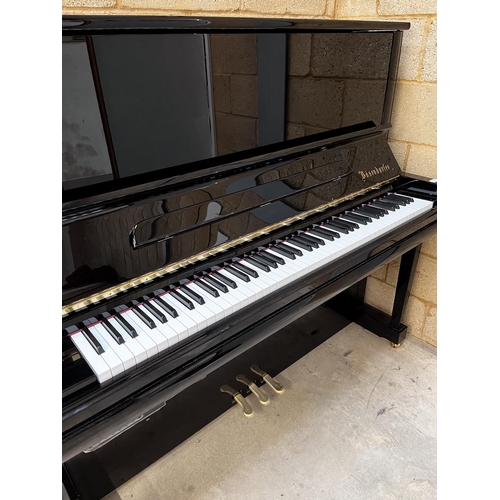 110 - Bösendorfer (c2018)A Model 130 CL upright piano in a bright ebonised case; this instrument is fitted... 