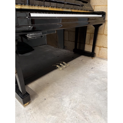 110 - Bösendorfer (c2018)A Model 130 CL upright piano in a bright ebonised case; this instrument is fitted... 