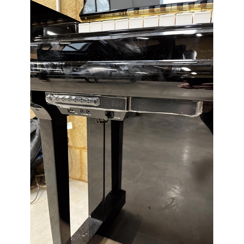 110 - Bösendorfer (c2018)A Model 130 CL upright piano in a bright ebonised case; this instrument is fitted... 