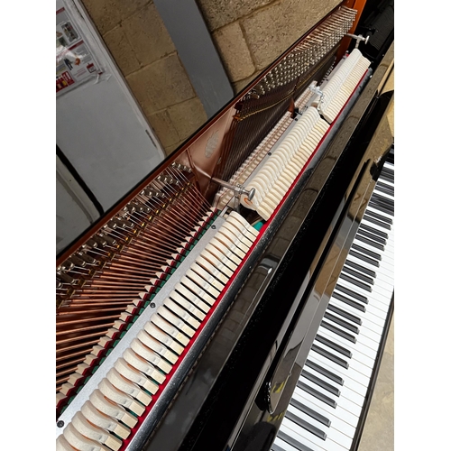 110 - Bösendorfer (c2018)A Model 130 CL upright piano in a bright ebonised case; this instrument is fitted... 