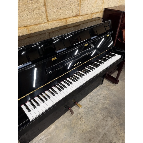 111 - Yamaha (c1995)A Model E108 upright piano in a bright ebonised case; together with a matching stool.... 