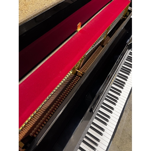 111 - Yamaha (c1995)A Model E108 upright piano in a bright ebonised case; together with a matching stool.... 