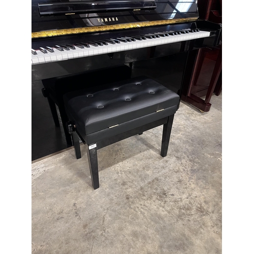 111 - Yamaha (c1995)A Model E108 upright piano in a bright ebonised case; together with a matching stool.... 
