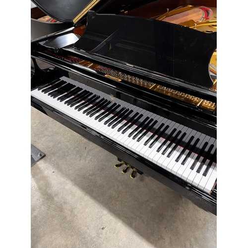 115 - Steinway (c2000)A 9ft Model D grand piano in a bright ebonised case with a satin ebonised lid, on sq... 
