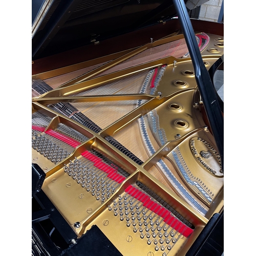 115 - Steinway (c2000)A 9ft Model D grand piano in a bright ebonised case with a satin ebonised lid, on sq... 