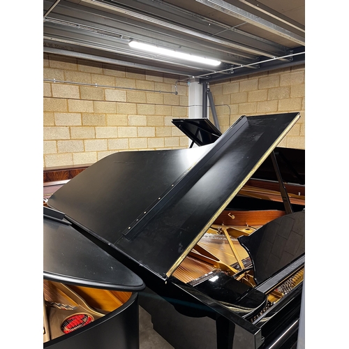 115 - Steinway (c2000)A 9ft Model D grand piano in a bright ebonised case with a satin ebonised lid, on sq... 