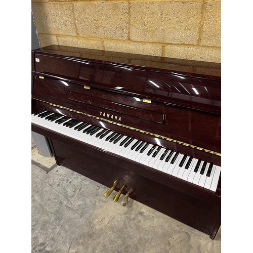 116 - Yamaha (c2002)A Model C-109 PM upright piano in a bright mahogany case.
