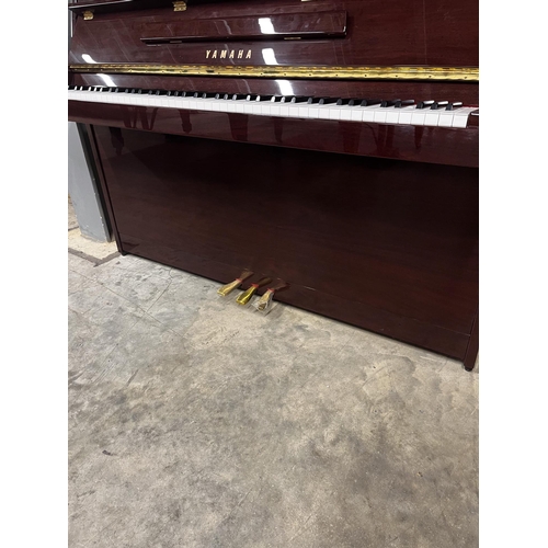 116 - Yamaha (c2002)A Model C-109 PM upright piano in a bright mahogany case.