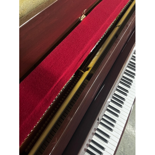 116 - Yamaha (c2002)A Model C-109 PM upright piano in a bright mahogany case.