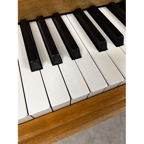 118 - Blüthner (c1934)A 4ft 11in Style 4A grand piano in a satin mahogany case on square tapered legs; tog... 