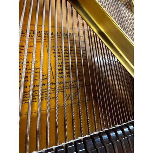 118 - Blüthner (c1934)A 4ft 11in Style 4A grand piano in a satin mahogany case on square tapered legs; tog... 