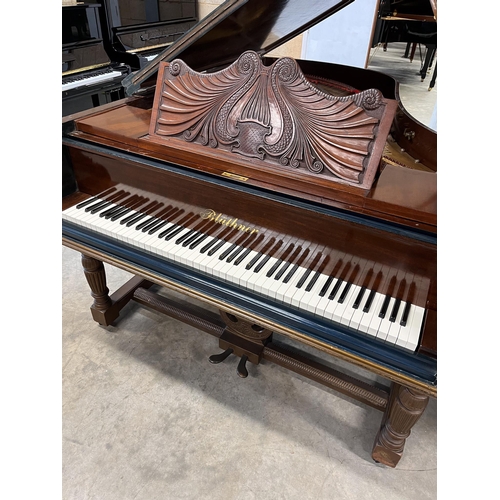 12 - Blüthner (c1886)A grand piano in a carved mahogany and blue painted case, raised on 3 sets of dual t... 
