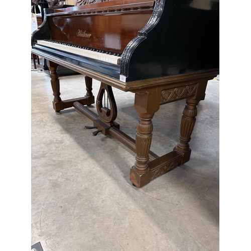 12 - Blüthner (c1886)A grand piano in a carved mahogany and blue painted case, raised on 3 sets of dual t... 