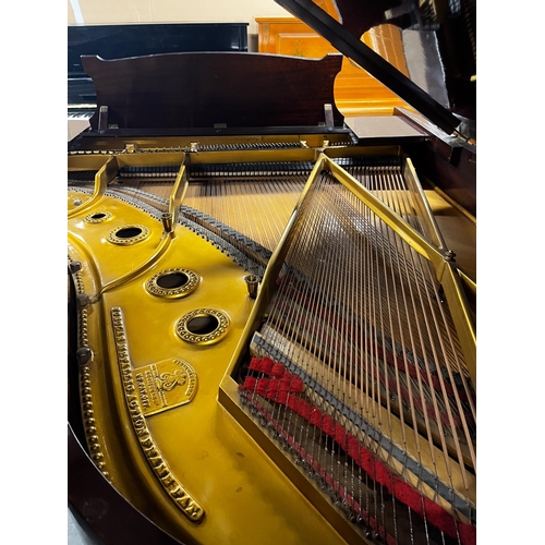 129 - Steinway (c1926)A 6ft 2in Model A grand piano in a mahogany case on square tapered legs; together wi... 