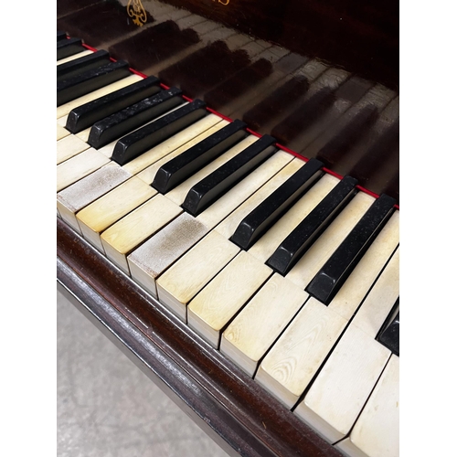 129 - Steinway (c1926)A 6ft 2in Model A grand piano in a mahogany case on square tapered legs; together wi... 