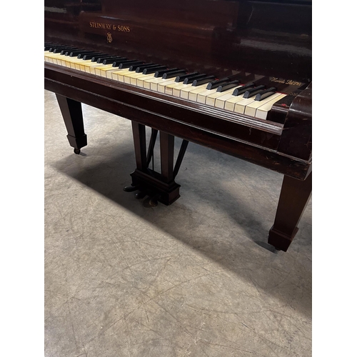 129 - Steinway (c1926)A 6ft 2in Model A grand piano in a mahogany case on square tapered legs; together wi... 