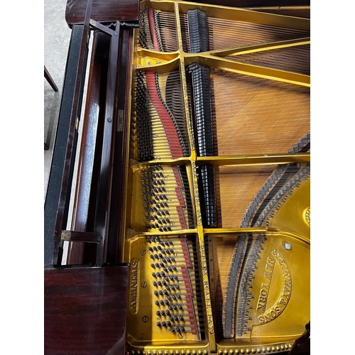 129 - Steinway (c1926)A 6ft 2in Model A grand piano in a mahogany case on square tapered legs; together wi... 