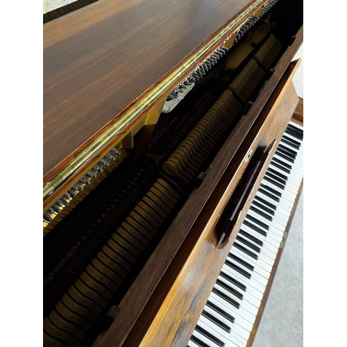 13 - Steinway (c1901)An upright piano in a rosewood case. IRN: JGTFUG2D
