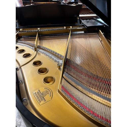 15 - Steinway (c1936)A 5ft 7in Model M grand piano in an ebonised case on square tapered legs; together w... 
